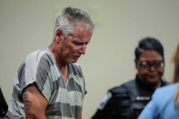 Colin Gray, 54, the father of Apalachee High School shooter Colt Gray, 14, enters the Barrow County courthouse for his first appearance, on Friday, Sept. 6, 2024, in Winder, Ga.